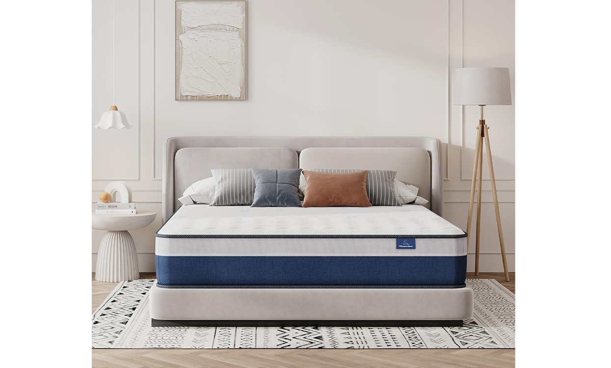 Close-up of the mattress corner showing the layered foam construction and fabric edge.