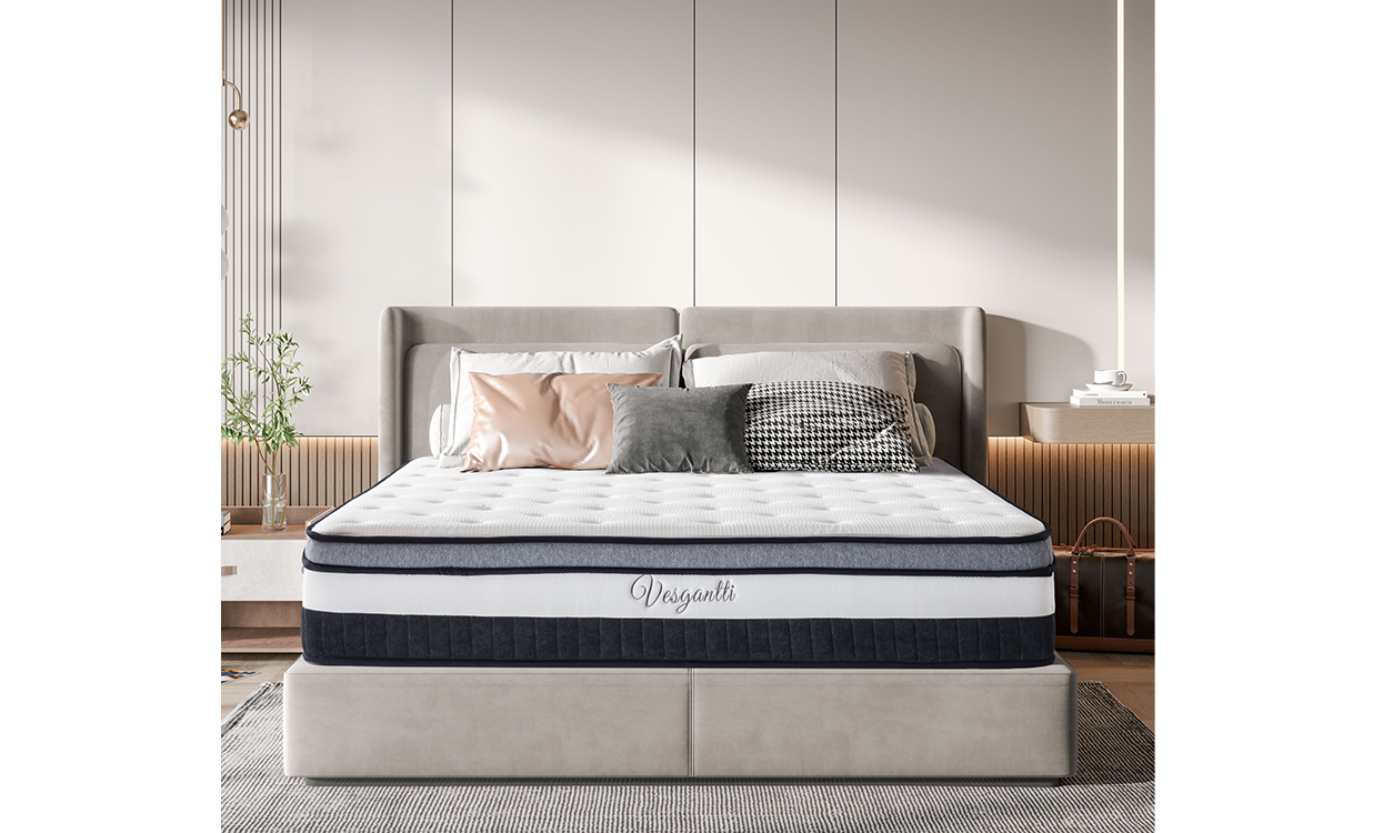 A bedroom with a bed featuring a mattress, emphasizing the mattress's plush and supportive qualities.